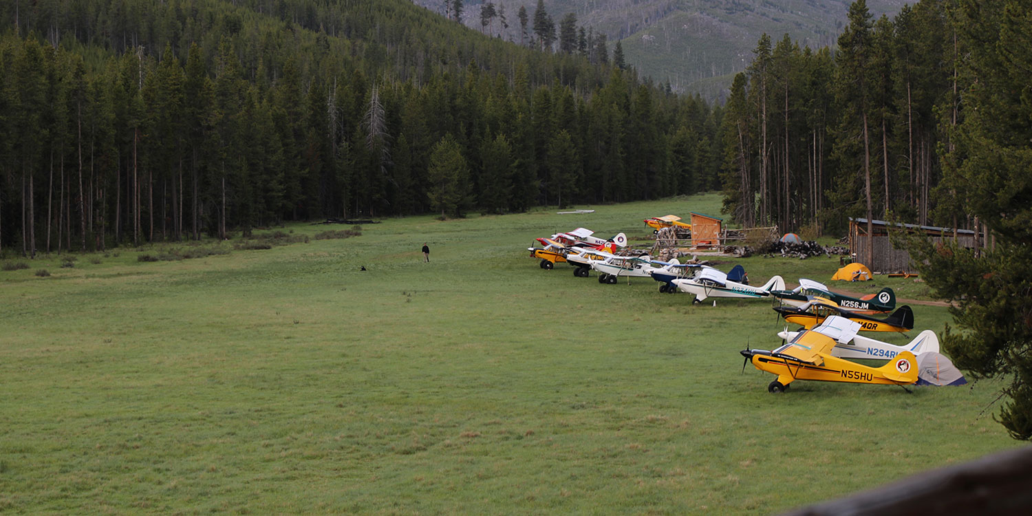 Husky Aircraft camping in the Frank Church Wilderness at the Flying B. STOL Aircraft. Short take off and landing at the Flying B, Frank Church Wilderness.